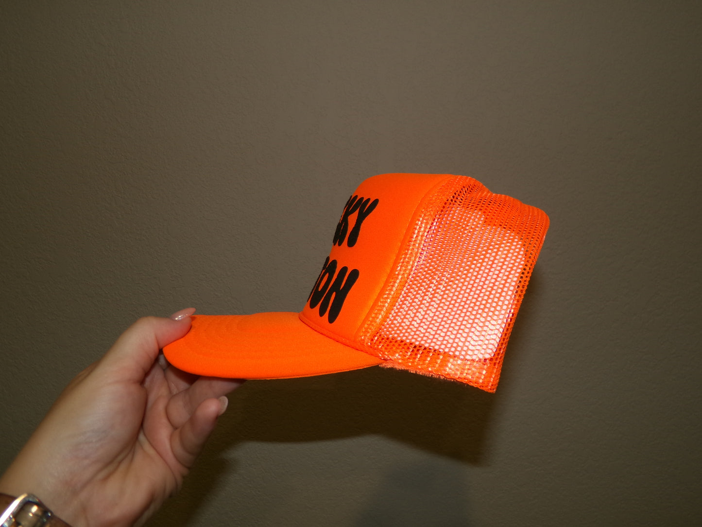 Orange/black trucker hat