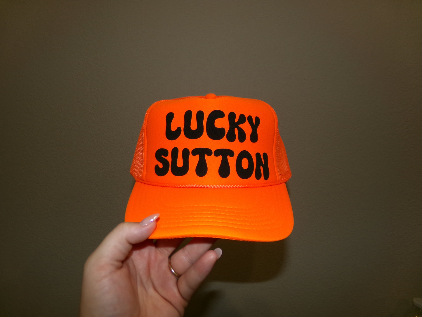 Orange/black trucker hat
